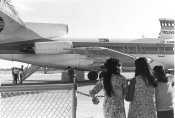 UN, No. 2075 Women in Dresses Observing Passenger Loading Onto Continental Micronesia Aircraft